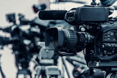 A selection of TV cameras on tripods.