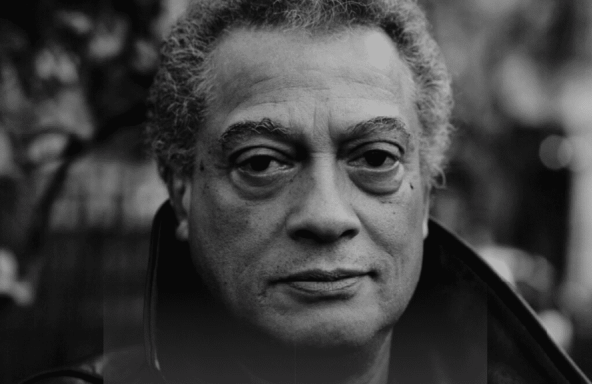 Black and white headshot of Sir Horace Ové, CBE. One of the leading black independent filmmakers to emerge in Britain.