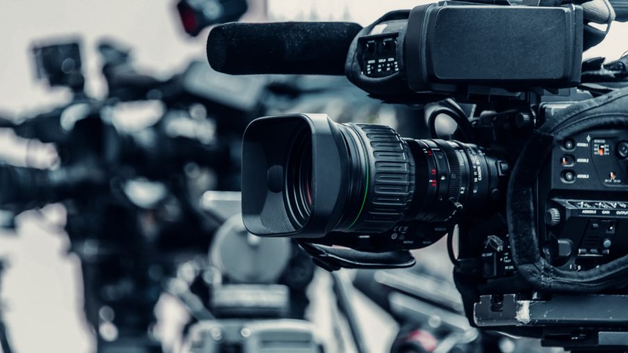 A selection of TV cameras on tripods.